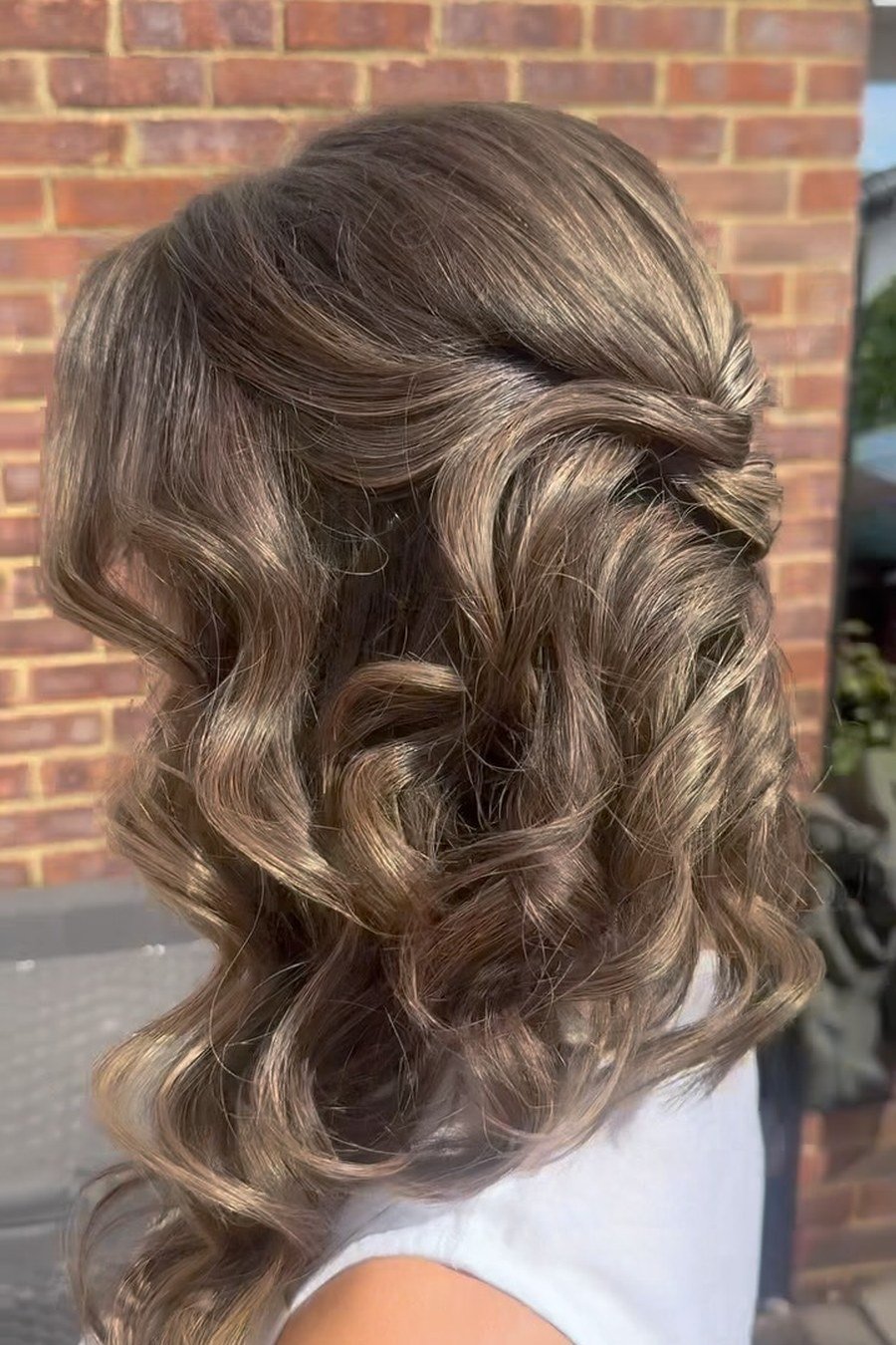 Side-Swept Half-Up — half up half down hairstyles for women