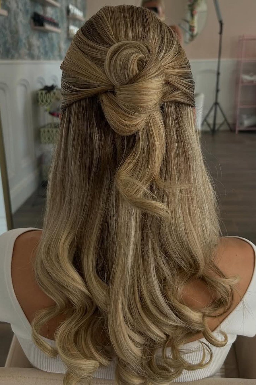 Half-Up Twisted Bun — half up half down hairstyles for women