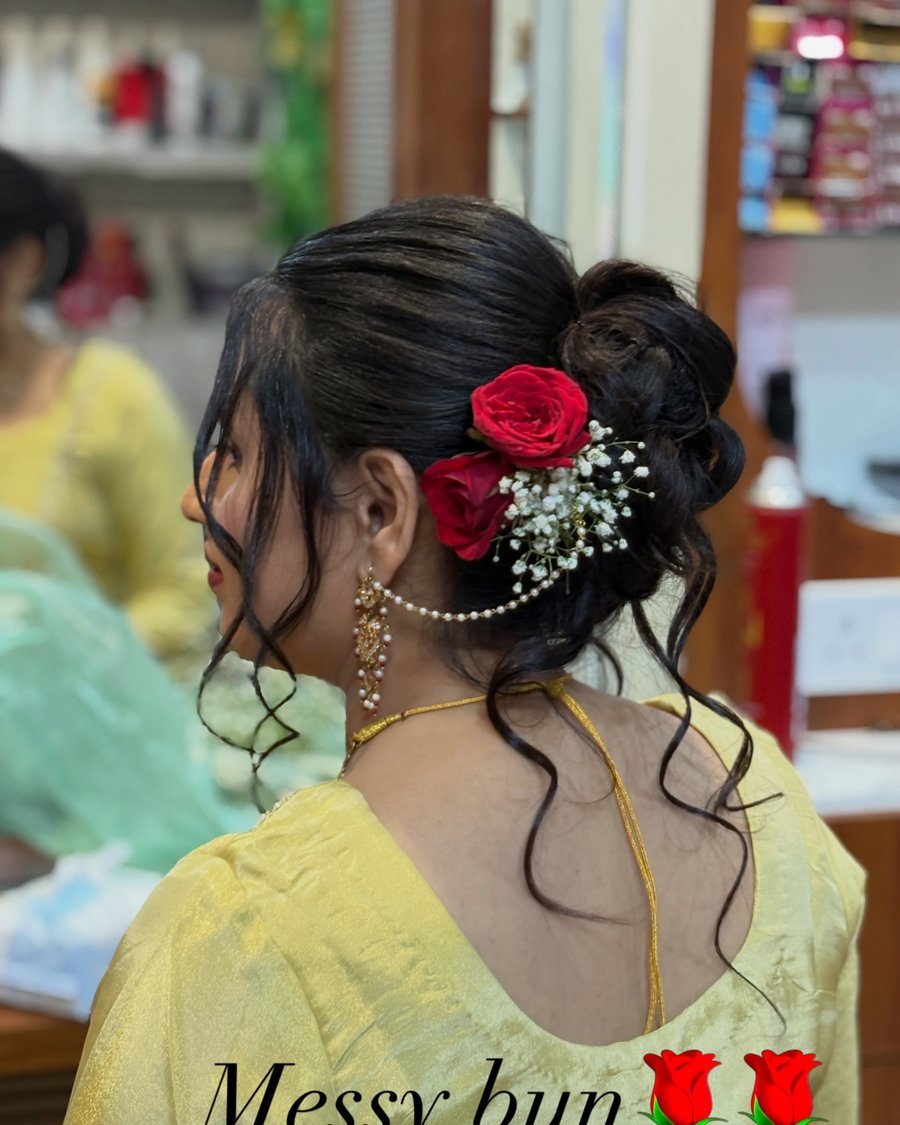 Messy Bun with a Festive Barrette - holiday hairstyle idea for women