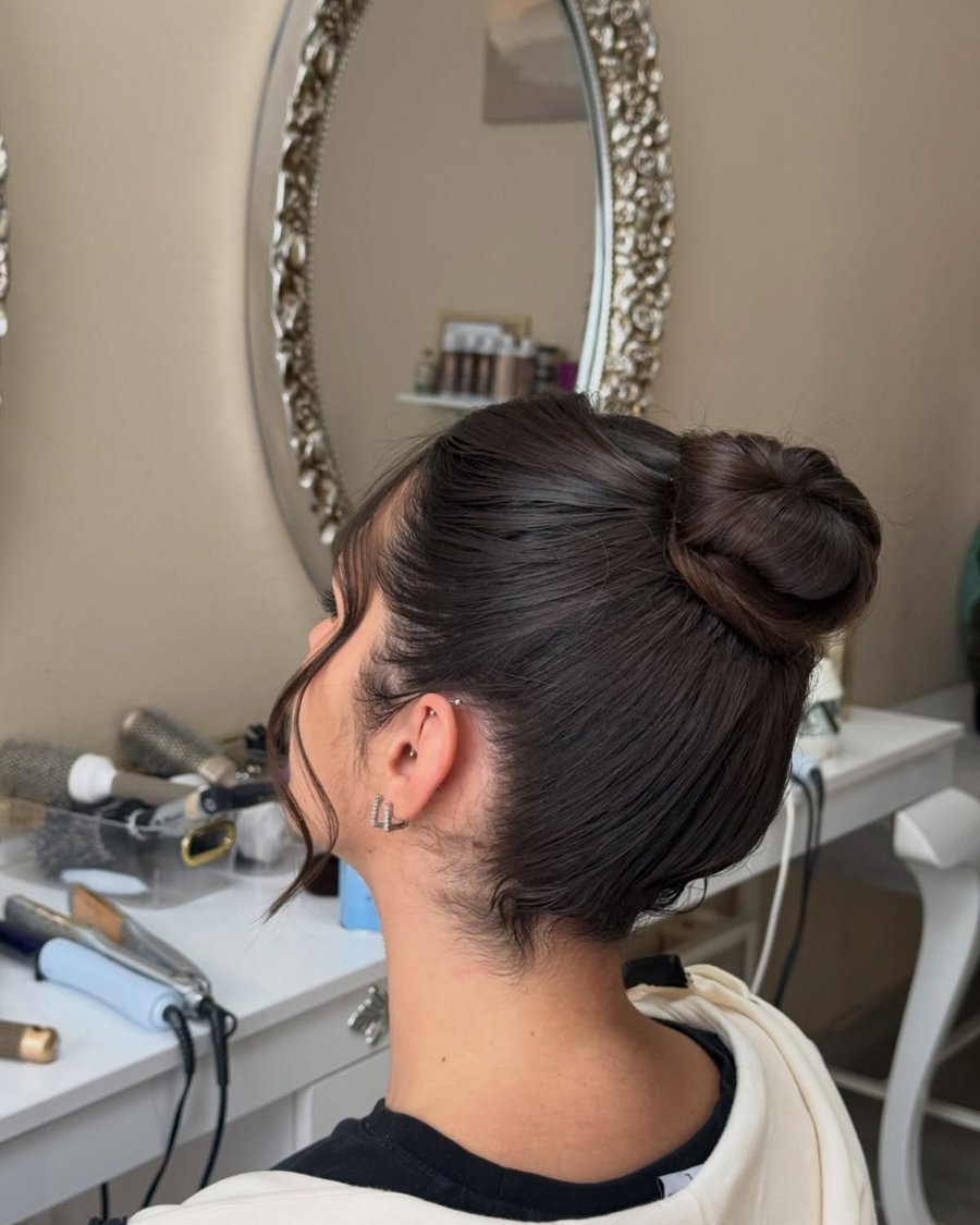 Sleek High Bun - holiday hairstyle idea for women