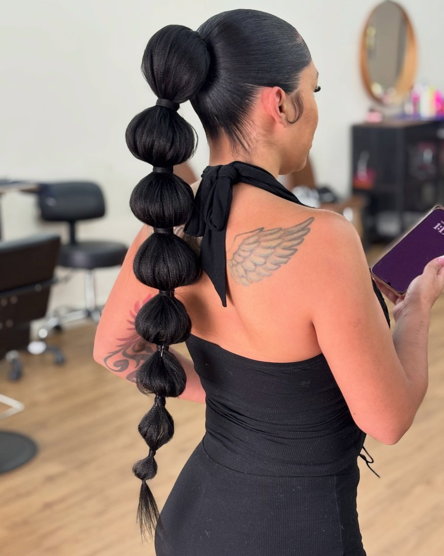 Bubble Ponytail with Ribbon - holiday hairstyle idea for women
