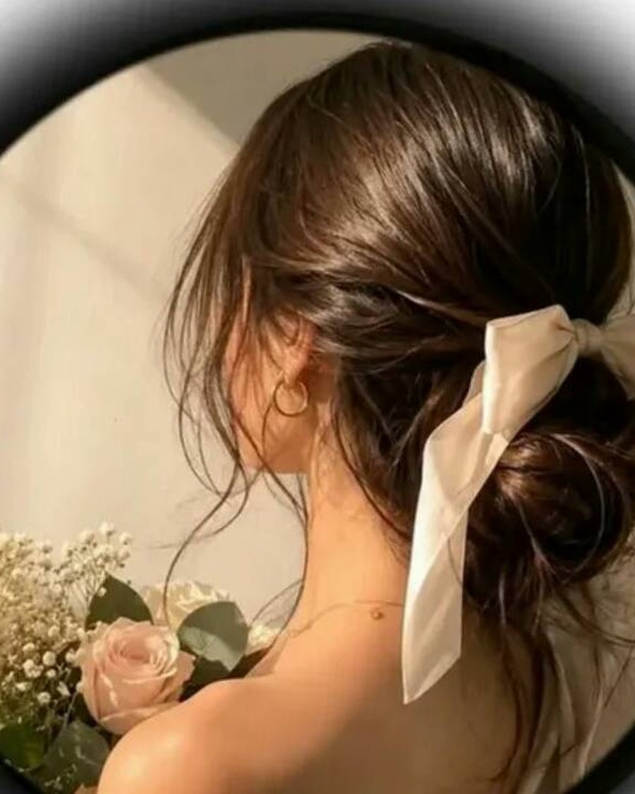 Ribbon Bow Half-Up - holiday hairstyle idea for women