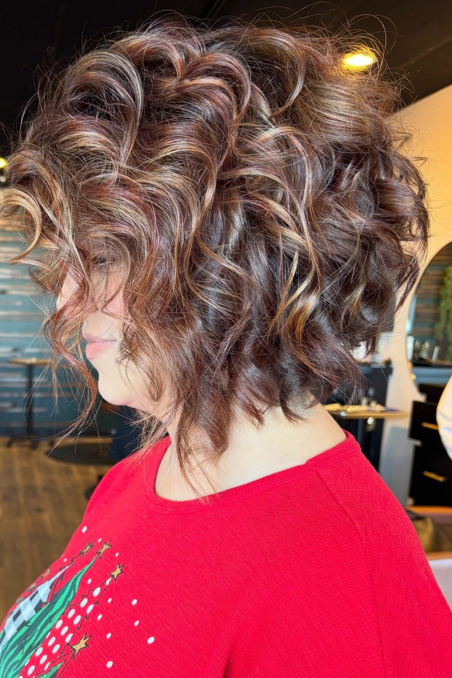 Angled Curly Lob - layered short curly haircuts