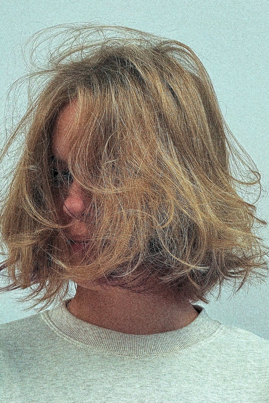 Messy Curly Bob with Highlights - layered short curly haircuts