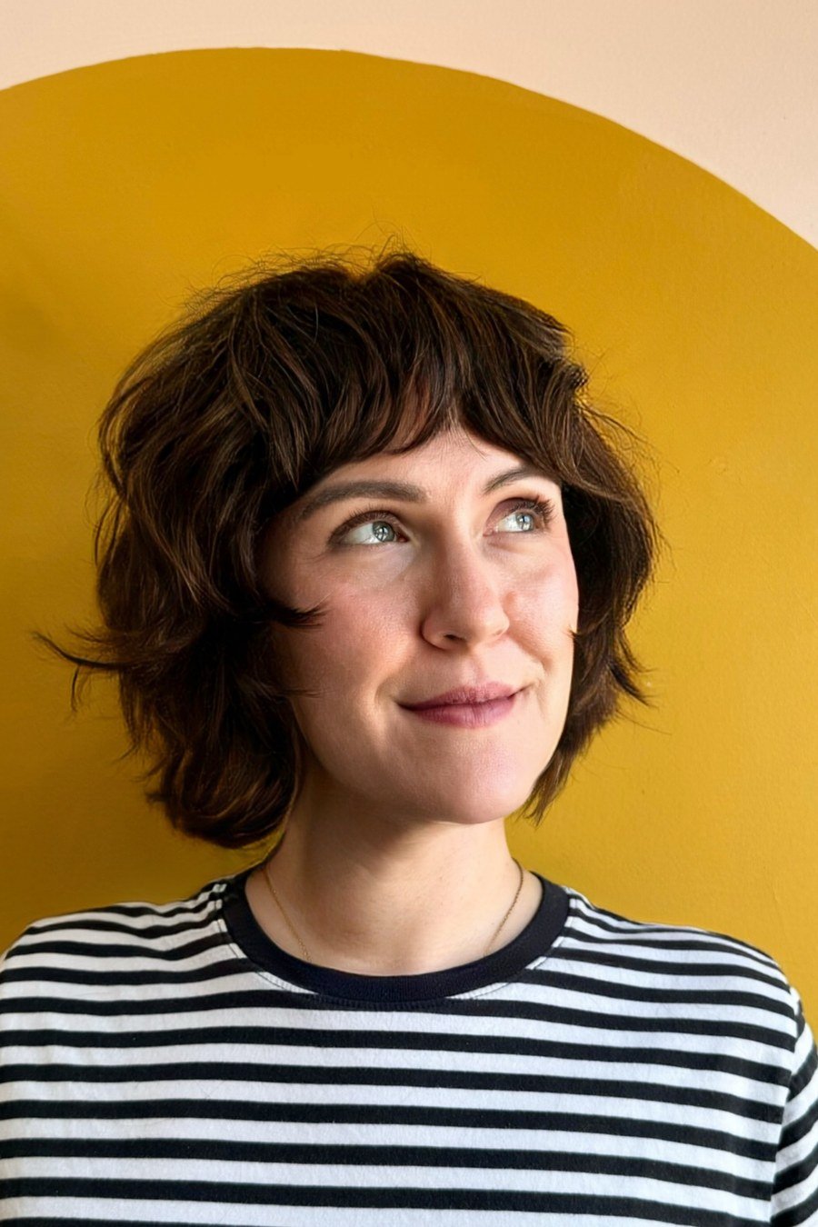 Short Curly Shag with Curtain Bangs - layered short curly haircuts