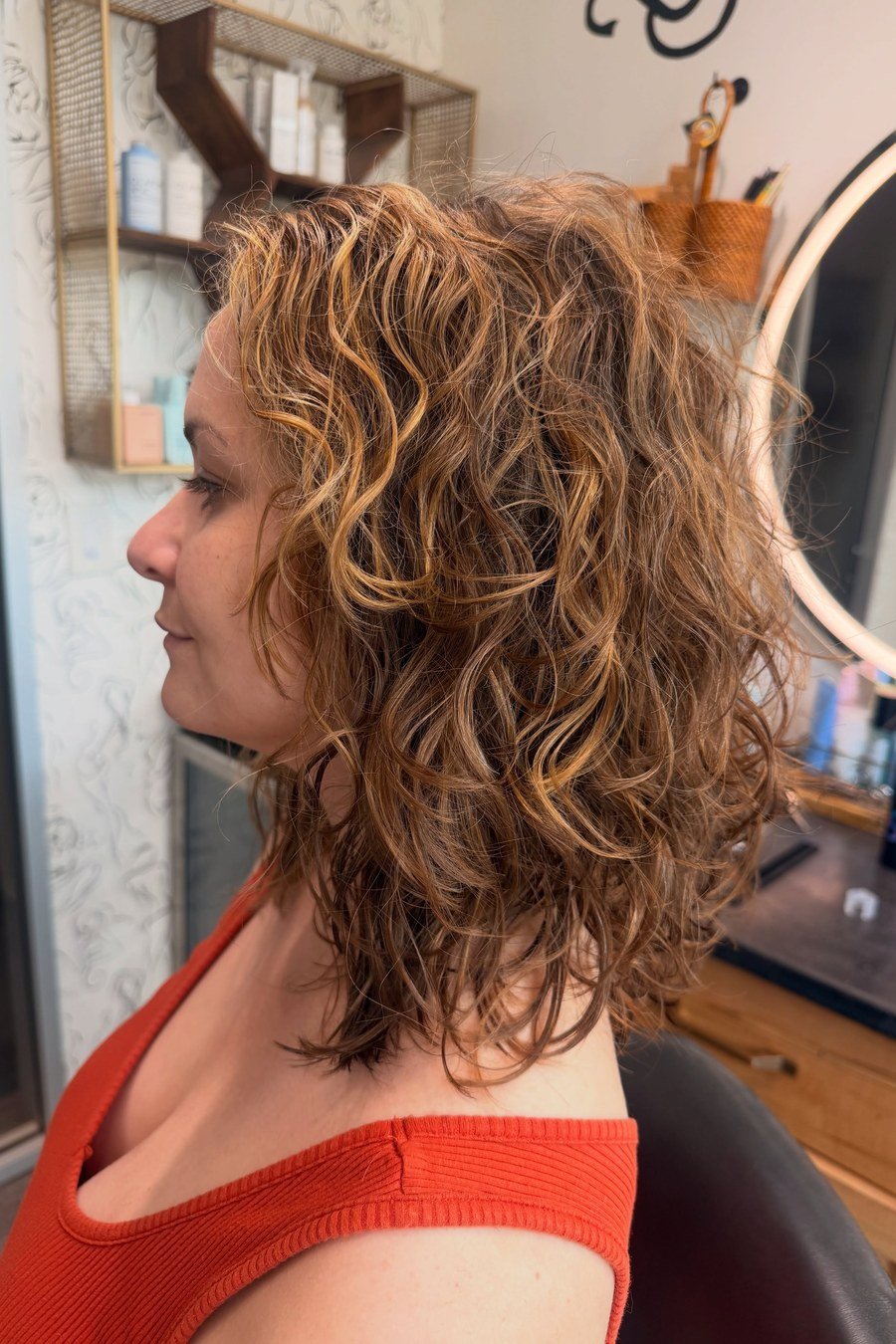 Bouncy Curly Lob with Layers - layered short curly haircuts