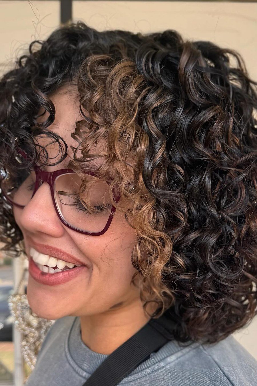 Short Curly Cut with Caramel Balayage - layered short curly haircuts