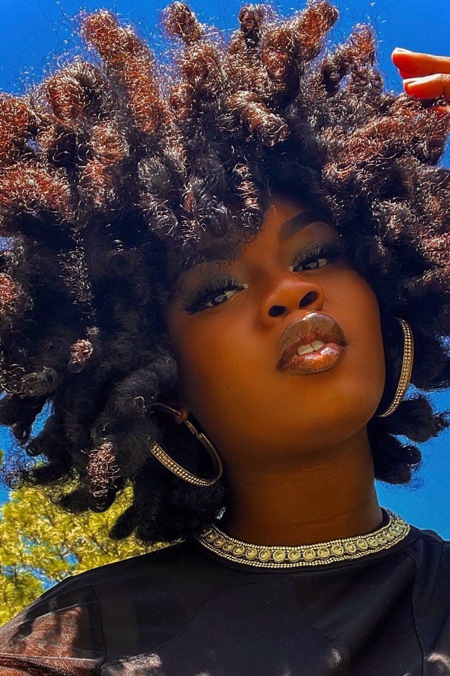 Short Afro Curls with Defined Layers - layered short curly haircuts