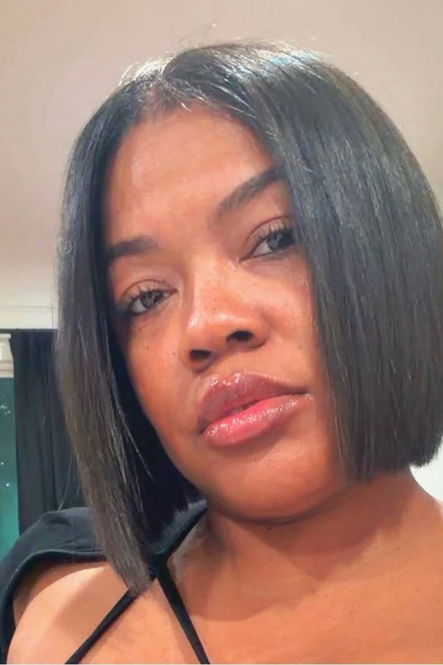 Sleek Silk-Pressed Bob — low maintenance black woman ear length short bob