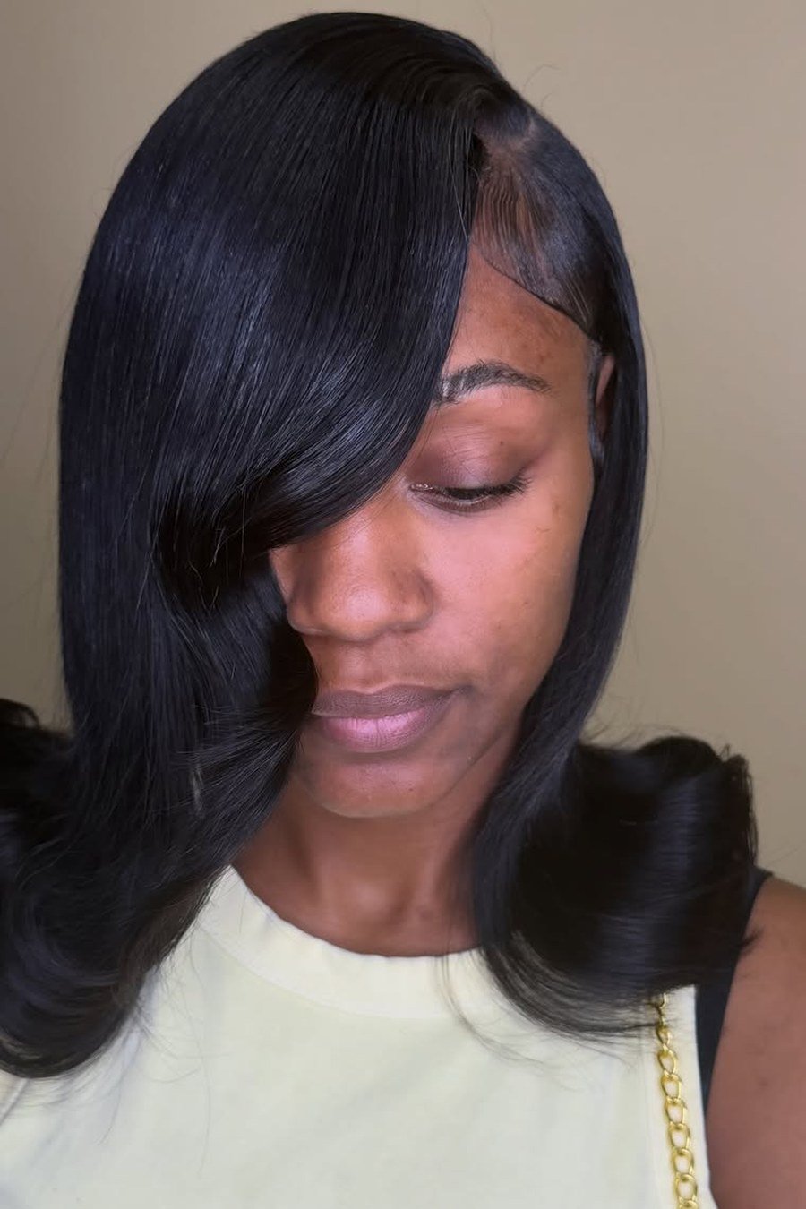 Deep Side-Sweep Bob — low maintenance black woman ear length short bob