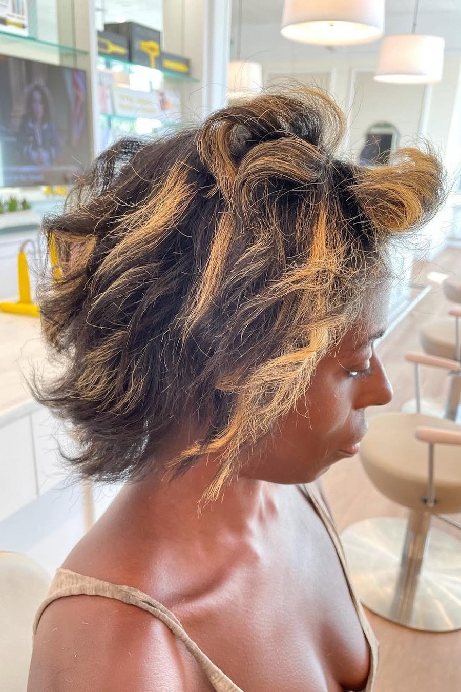 Wavy Bob with Highlights — low maintenance black woman ear length short bob