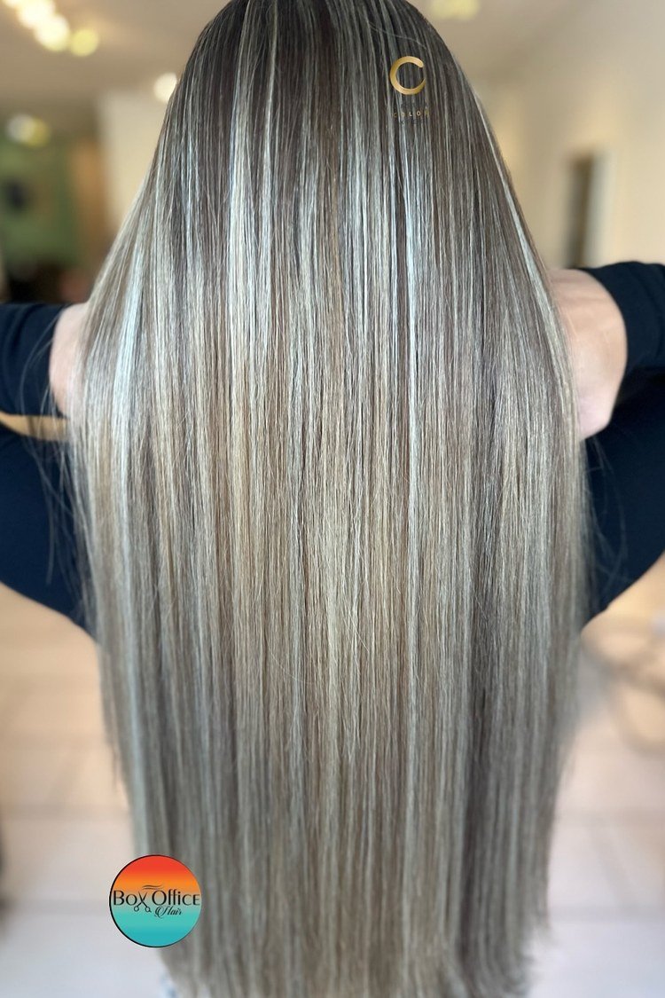 Platinum streaks on dark brown hair
