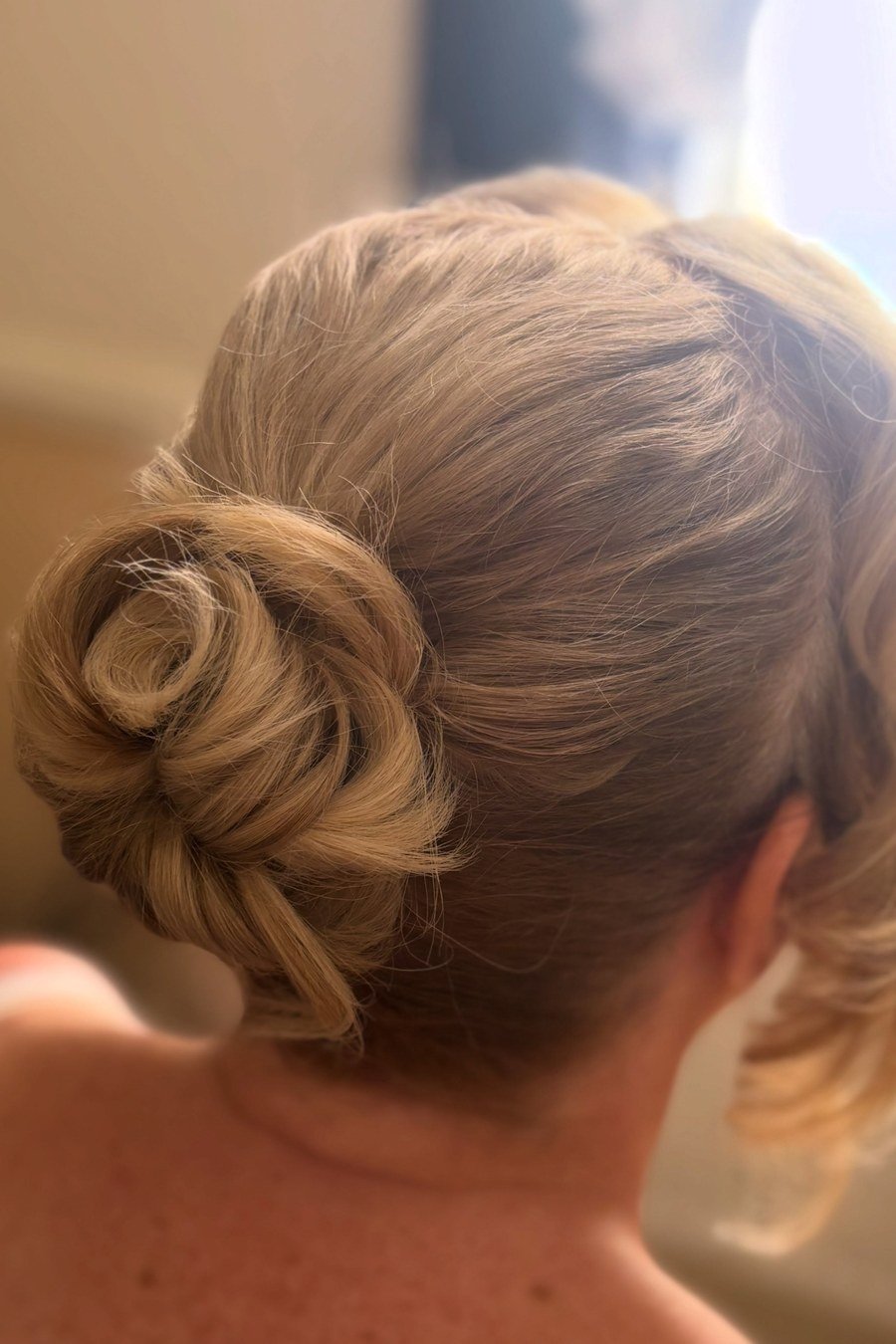 Rolled Low Bun — elegant updo hairstyles for women