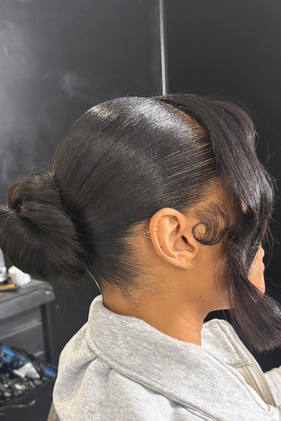 Side-Swept Low Bun — elegant updo hairstyles for women